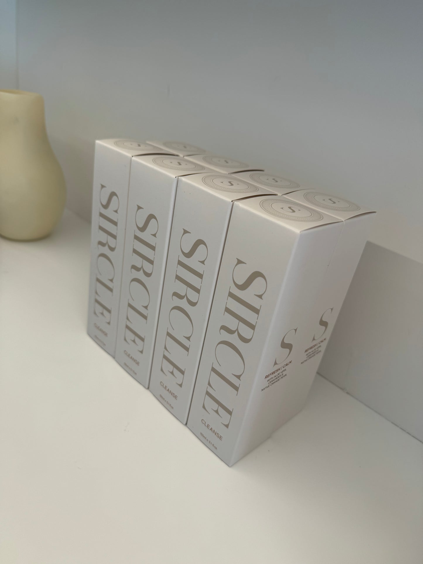 SIRCLE CLEANSE gel cleanser with white and gold color scheme